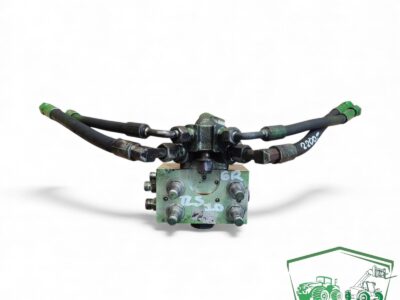Blok zaworu amortyzacji osi TLS AL205562 John Deere 6050R